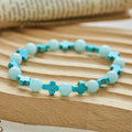 Pulseira Cruz de Turquesa Brilha no Escuro