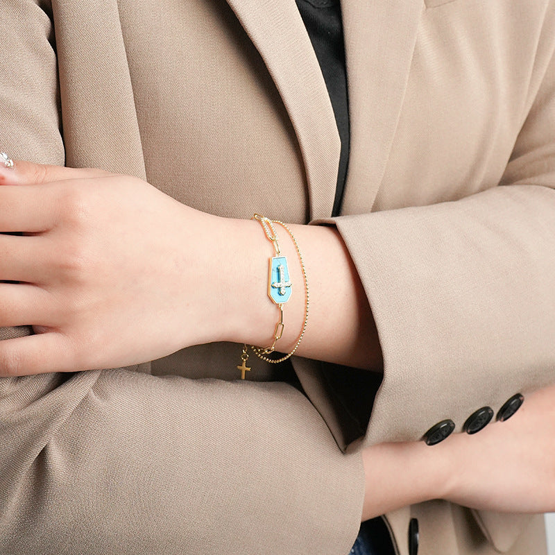 Pulseira Cruz com Escudo de Turquesa Amparo