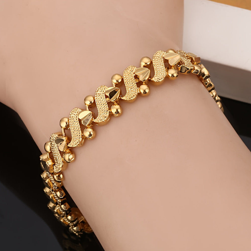 Zélia Ornate Wave Link Bracelet | Gold