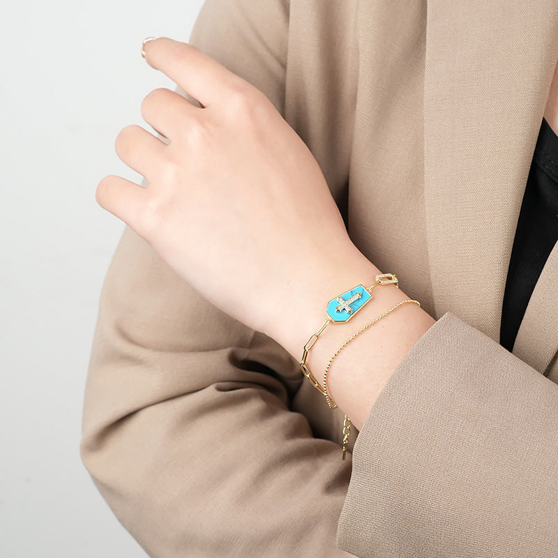 Pulseira Cruz com Escudo de Turquesa Amparo