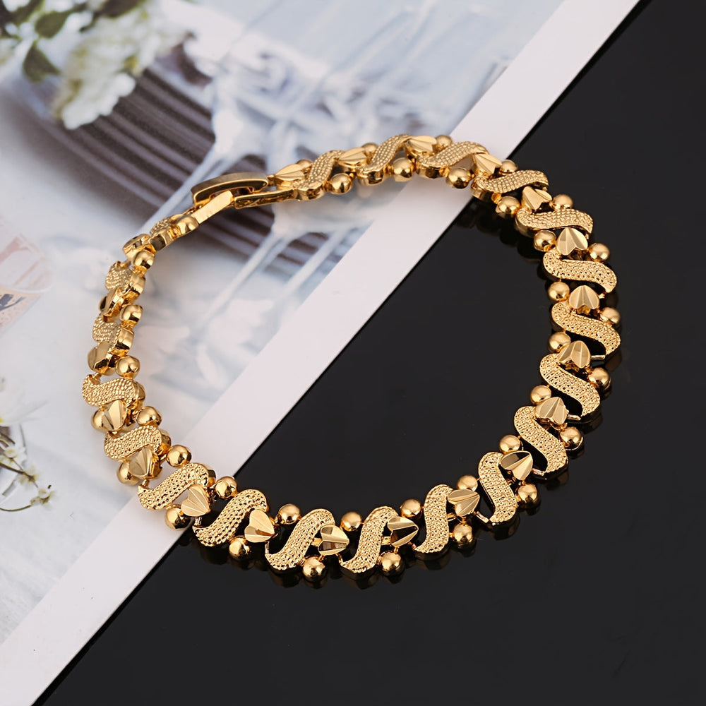 Zélia Ornate Wave Link Bracelet | Gold
